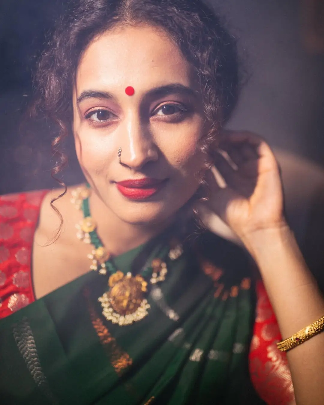 Pooja Ramachandran Stills in Green Saree Red Blouse